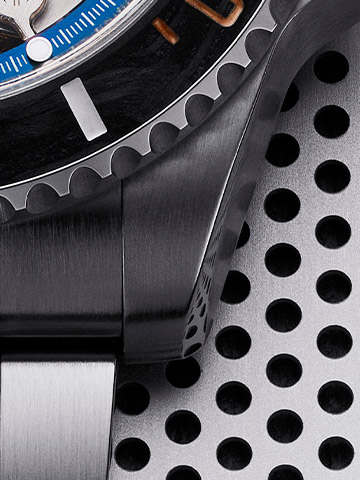 close up of a carbon forged bezel